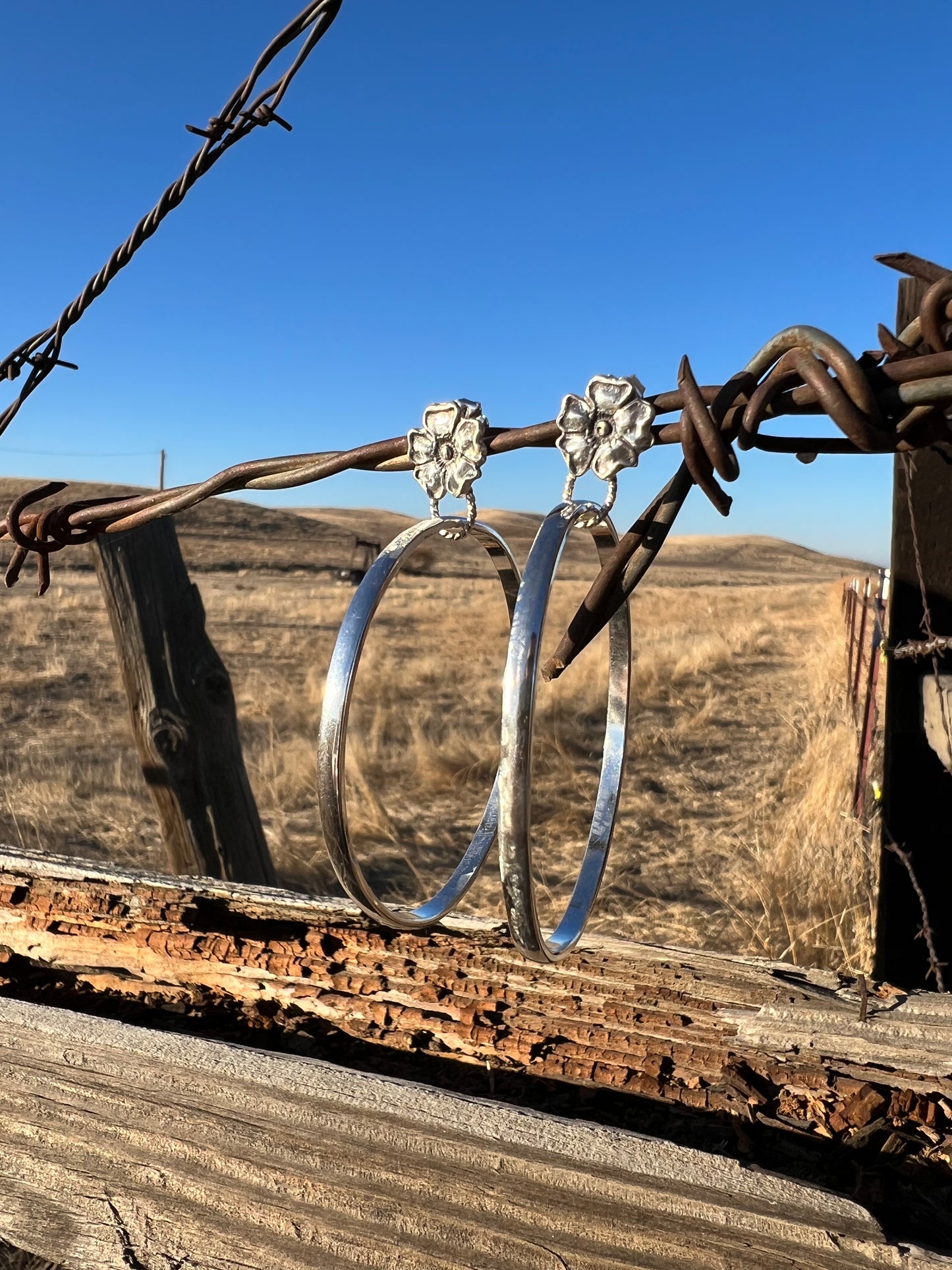 Sterling Silver Flower Hoops.